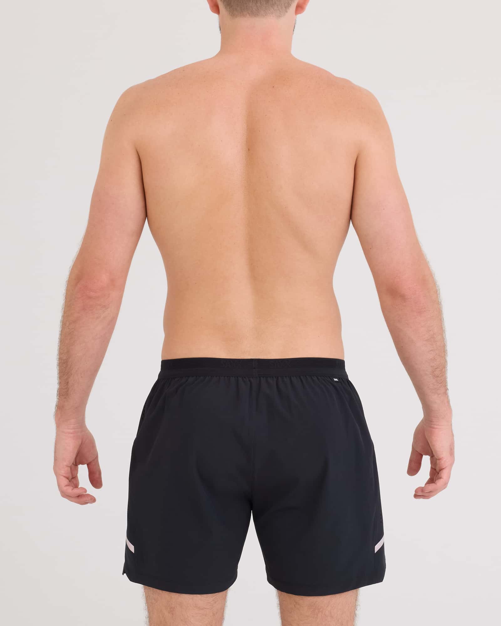 Back - Model wearing Run For All 2N1 Short 5" in Black