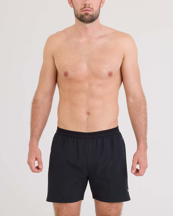 Front - Model wearing Run For All 2N1 Short 5" in Black
