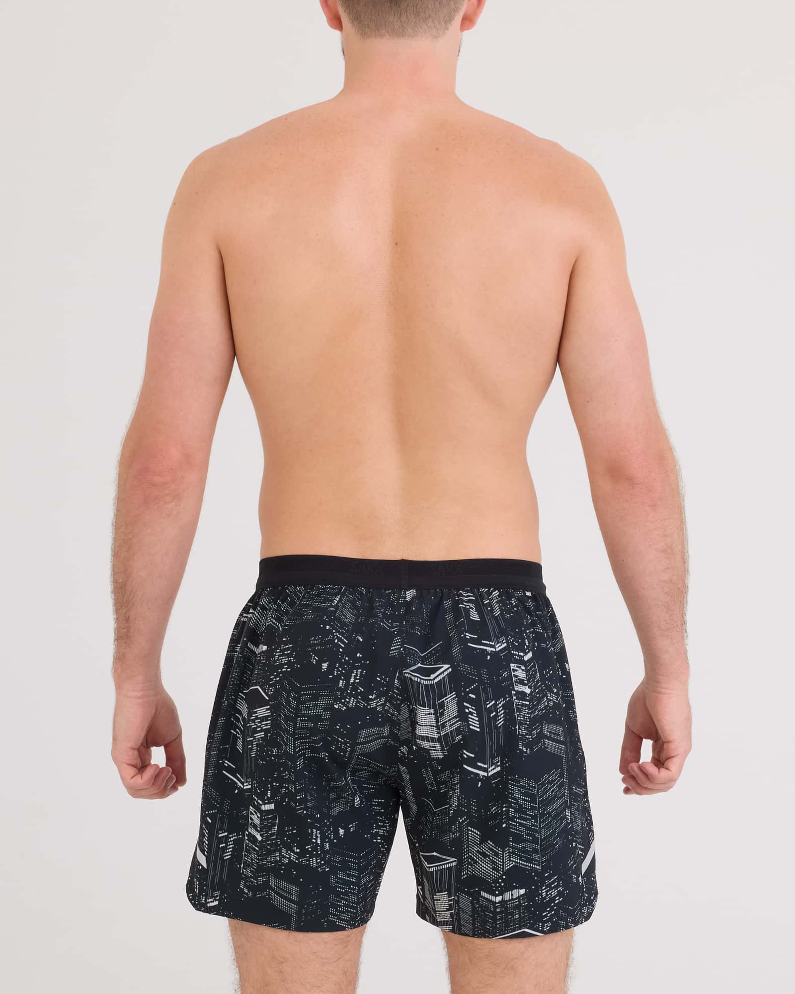 Back - Model wearing Run For All 2N1 Short 5" in Night City-Black