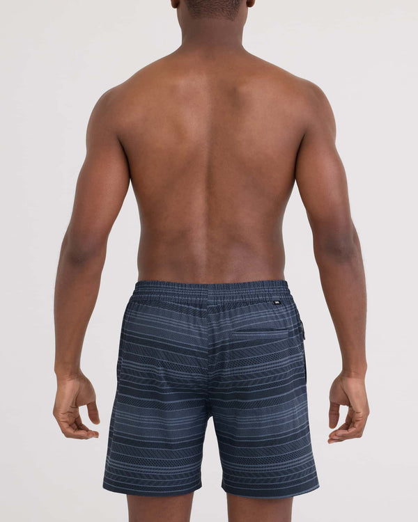 Back - Model wearing Sea To Shore 2N1 Volley Short 6" in Agitated Stripe-Indigo