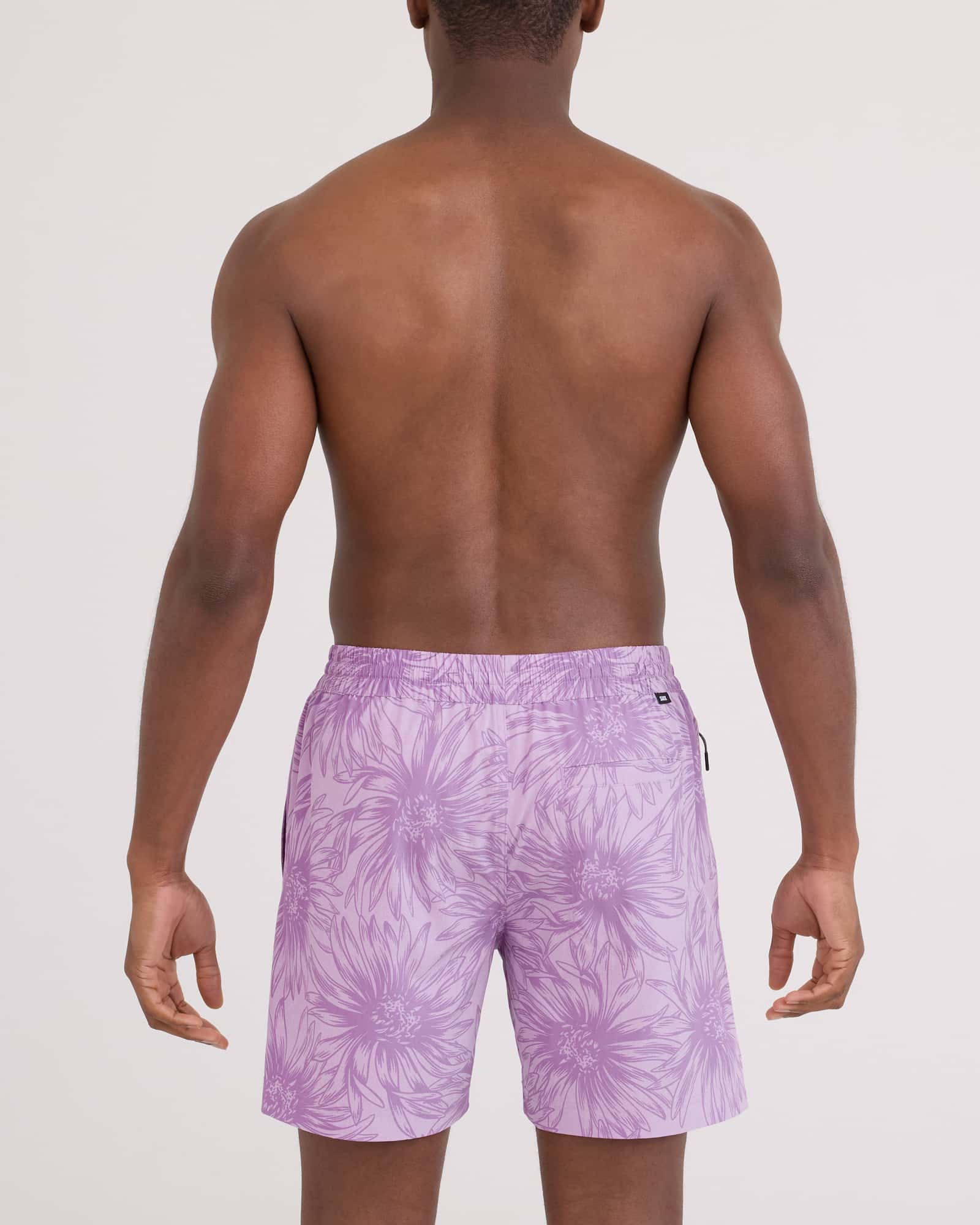Back - Model wearing Sea To Shore 2N1 Volley Short 6" in Big Daisy-Orchid