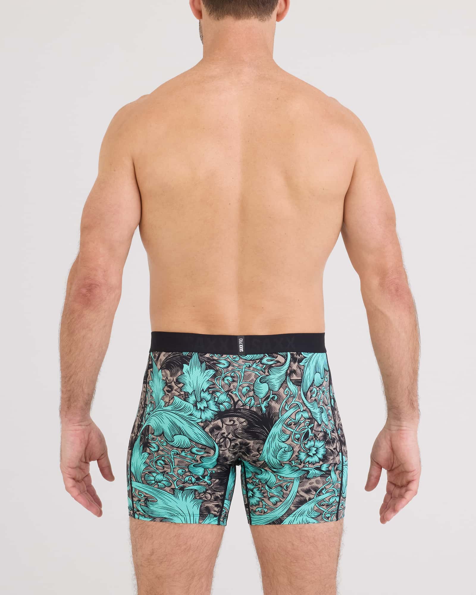 Back - Model wearing Smooth Flex Light Compression Boxer Brief in Fleur De League-Multi