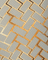 Pattern of interlocking bricks with a herringbone design on a textured surface.