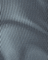 Close-up of textured gray fabric with horizontal lines