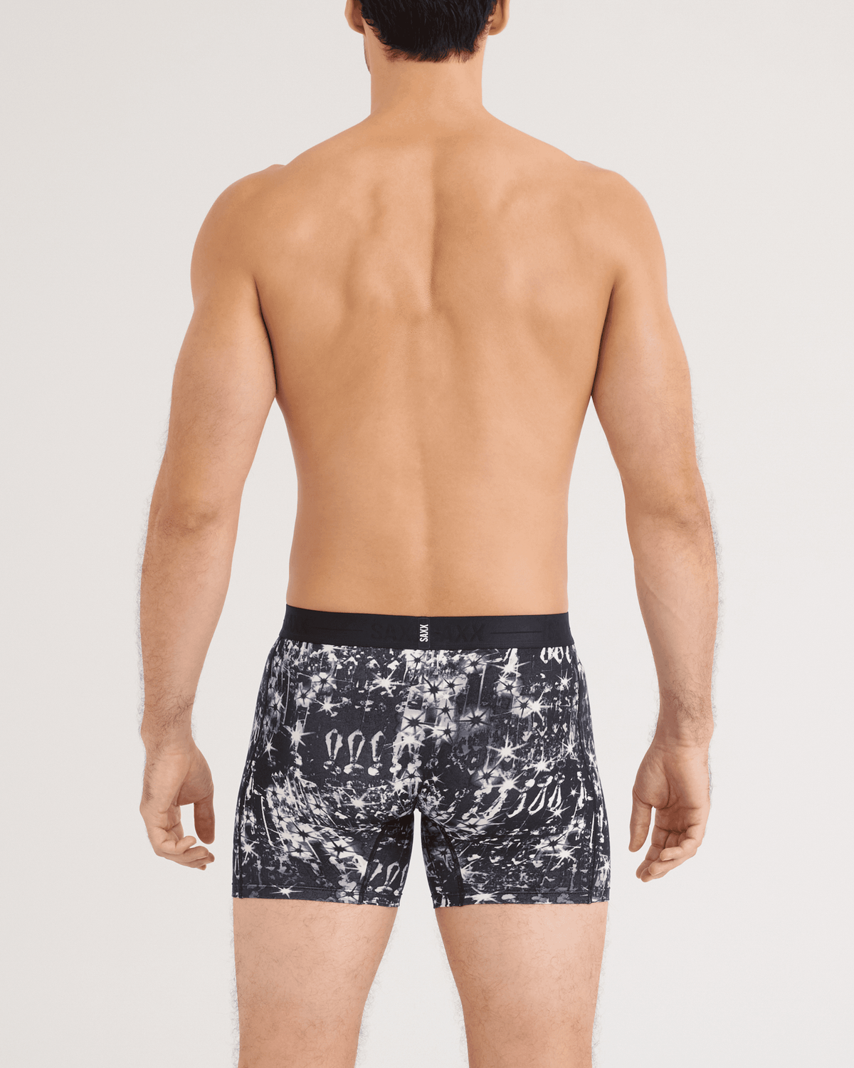 Back - Model wearing Smooth Luxe Micro Modal Boxer Brief in Chandelier-Black
