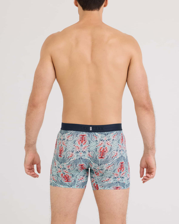 Back - Model wearing Smooth Luxe Micro Modal Boxer Brief in Lobster Flourish-Mint