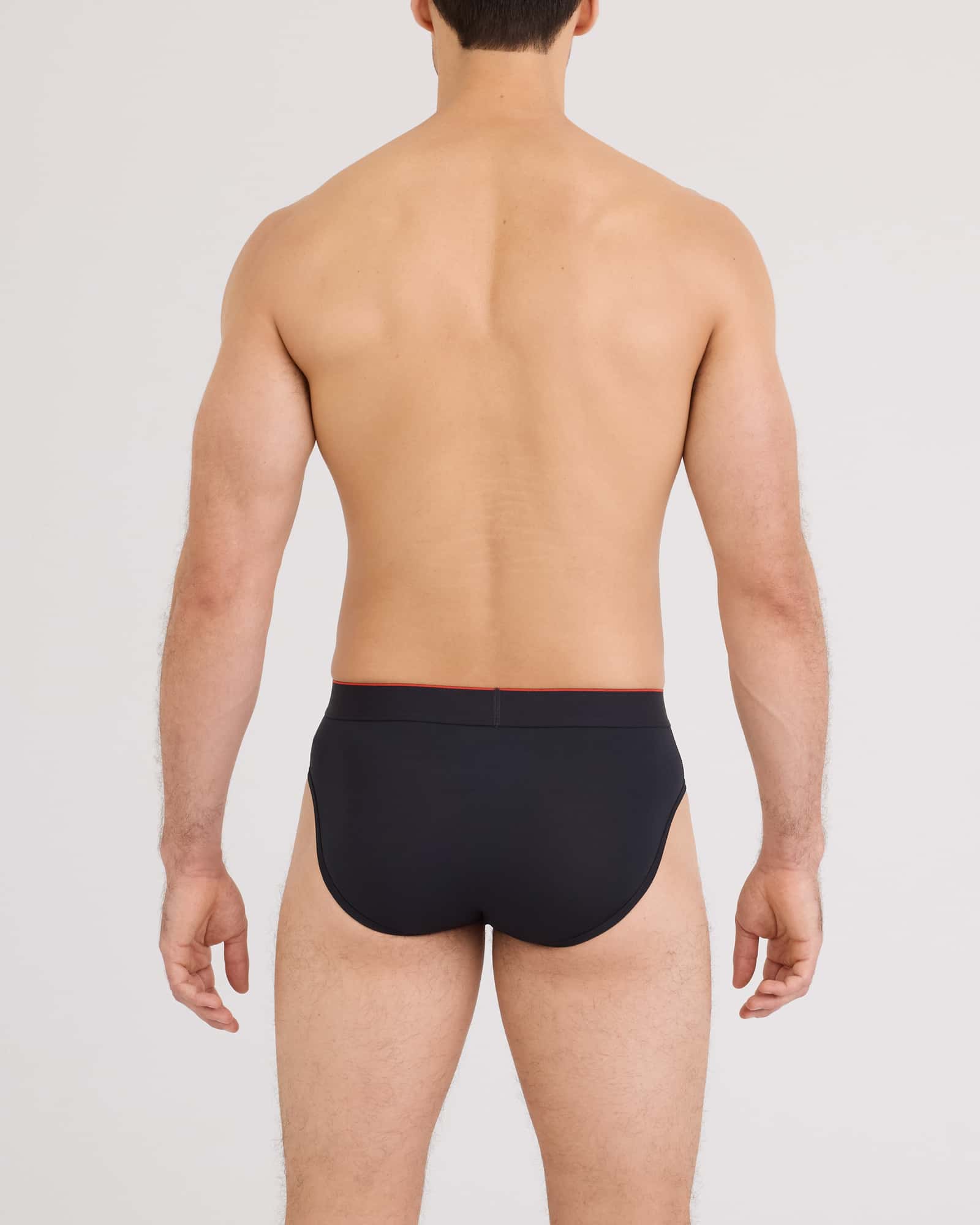 Back - Model wearing Multi-Sport Mesh Brief in Black