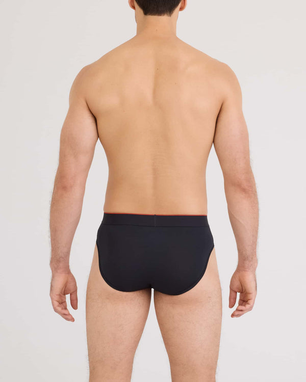Back - Model wearing Multi-Sport Mesh Brief in Black