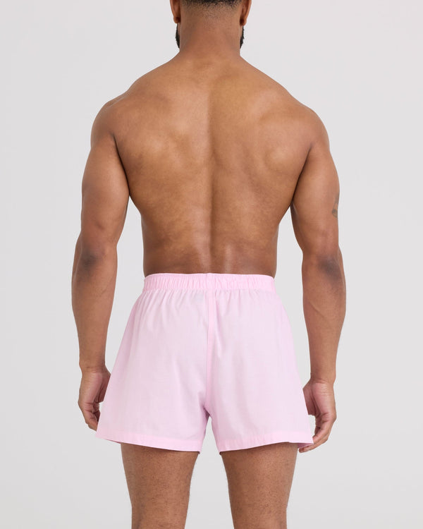 Back - Model wearing DropTemp Cooling Cotton Boxer Short in Chambray-Pink