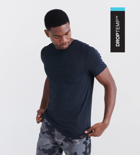 Man wearing black cooling tee and black cooling boxer briefs in camoflague print