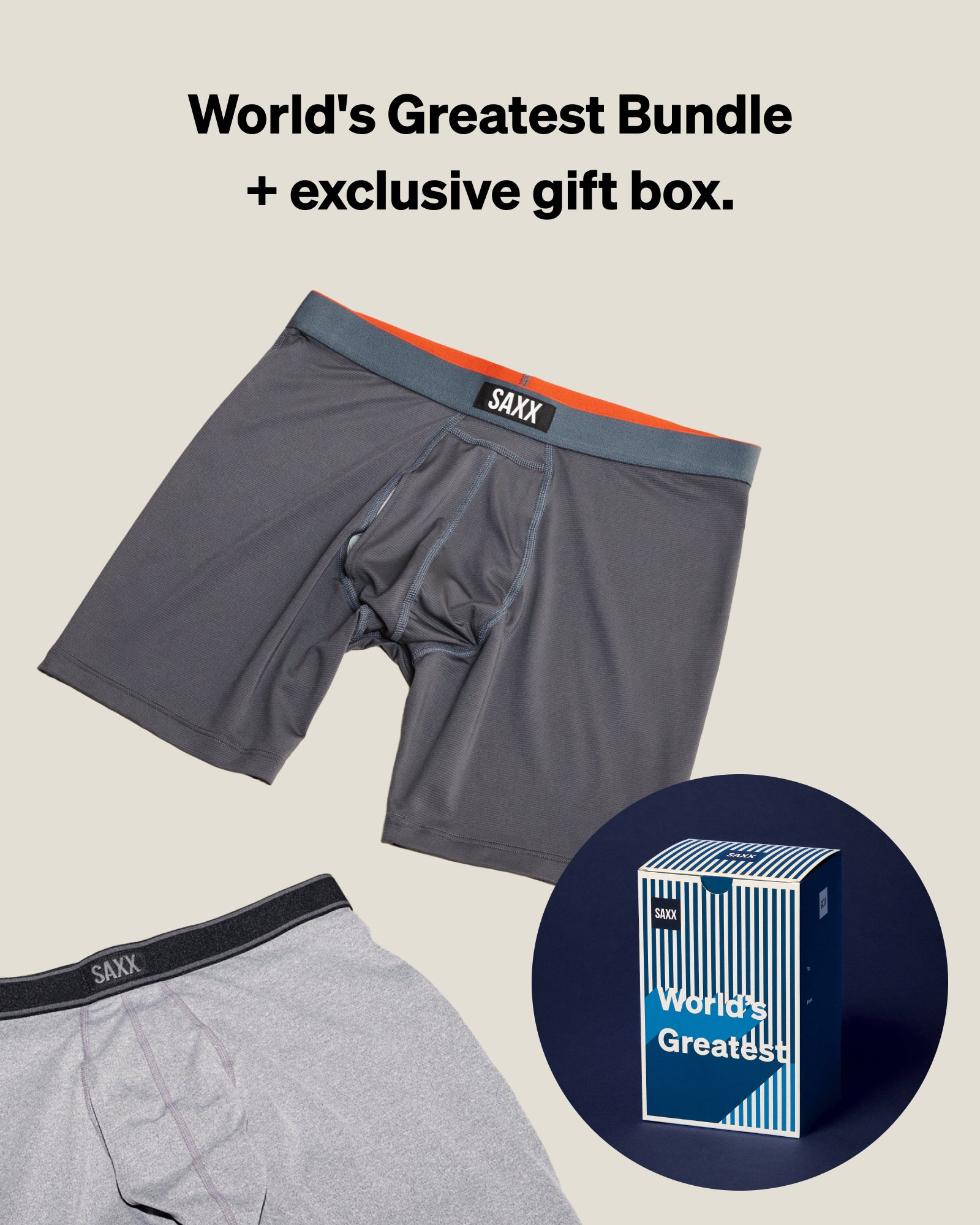 Gray boxer briefs with SAXX branding and an exclusive gift box on a beige background.
