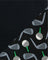 Pattern of golf clubs and balls on a black background