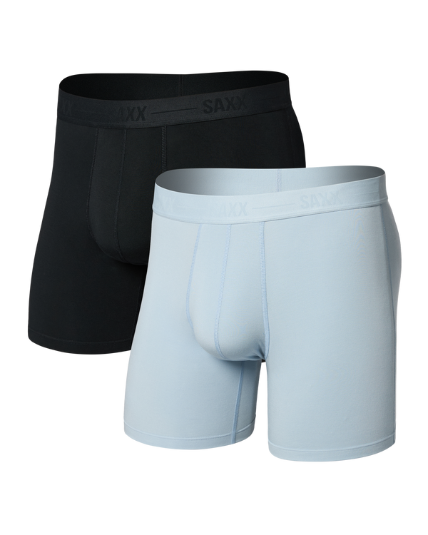 Two pairs of SAXX underwear, one black and one blue, on a white background.