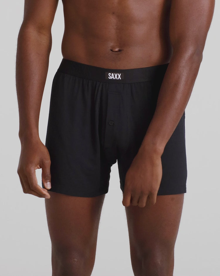 Model wearing Snooze Boxer Short in Black