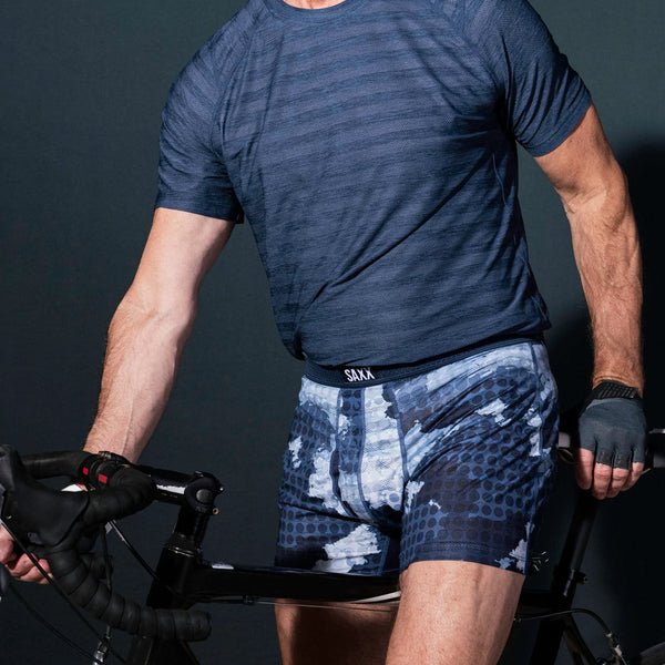 Model posing in Droptemp Cooling Mesh Boxer Brief Fly in Cloud Drop Camo- Navy
