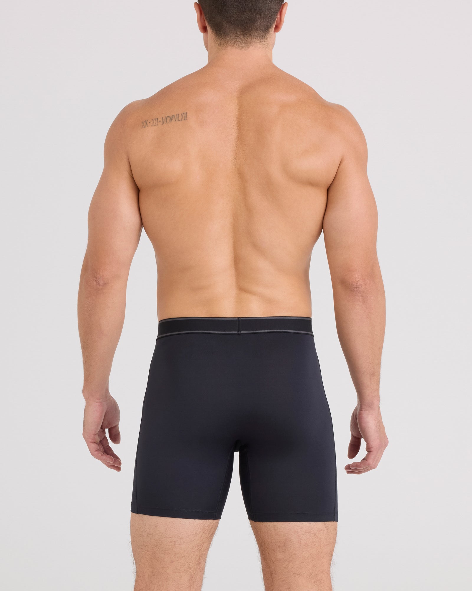 Back - Model wearing Daytripper Boxer Brief Fly in Black