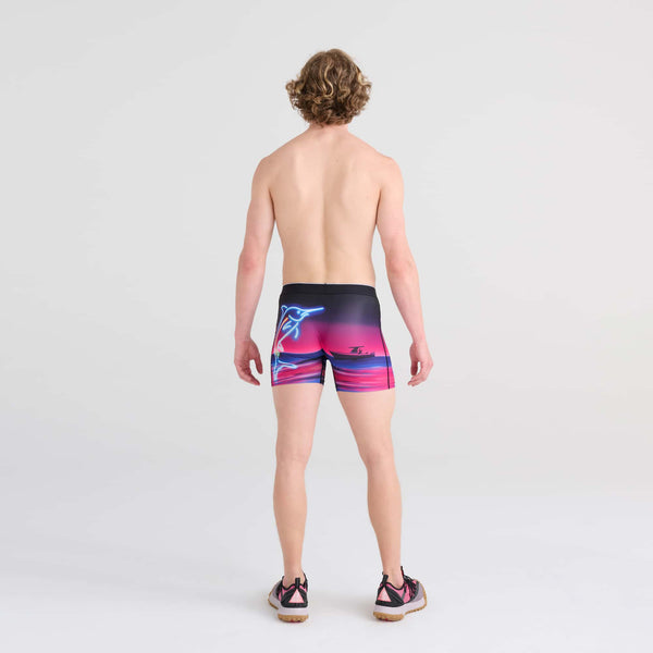 Back - Model wearing Volt Boxer Brief in Marlin Sunset- Magenta