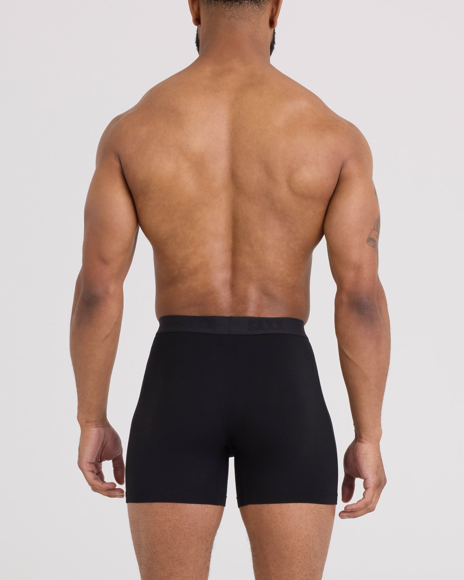 Back - Model wearing Ultra Super Soft Boxer Brief in Black
