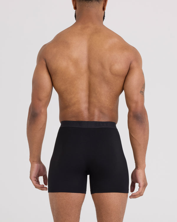 Back - Model wearing Ultra Super Soft Boxer Brief Fly in Black
