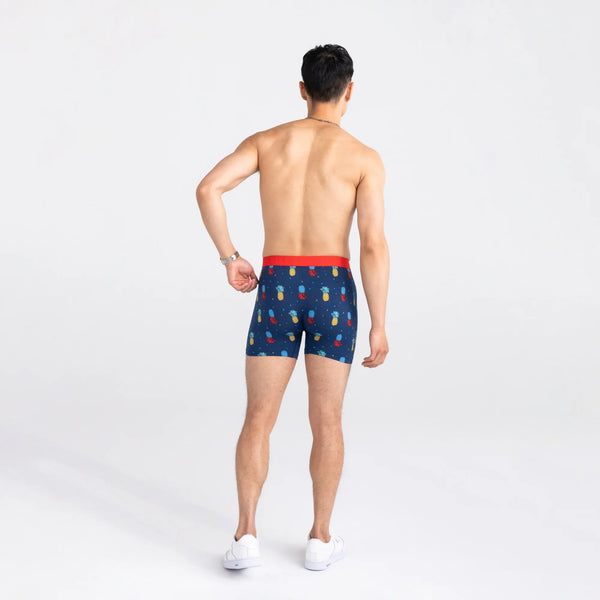 Back - Model wearing Ultra Super Soft Boxer Brief Fly in Pineapple Flip- Navy