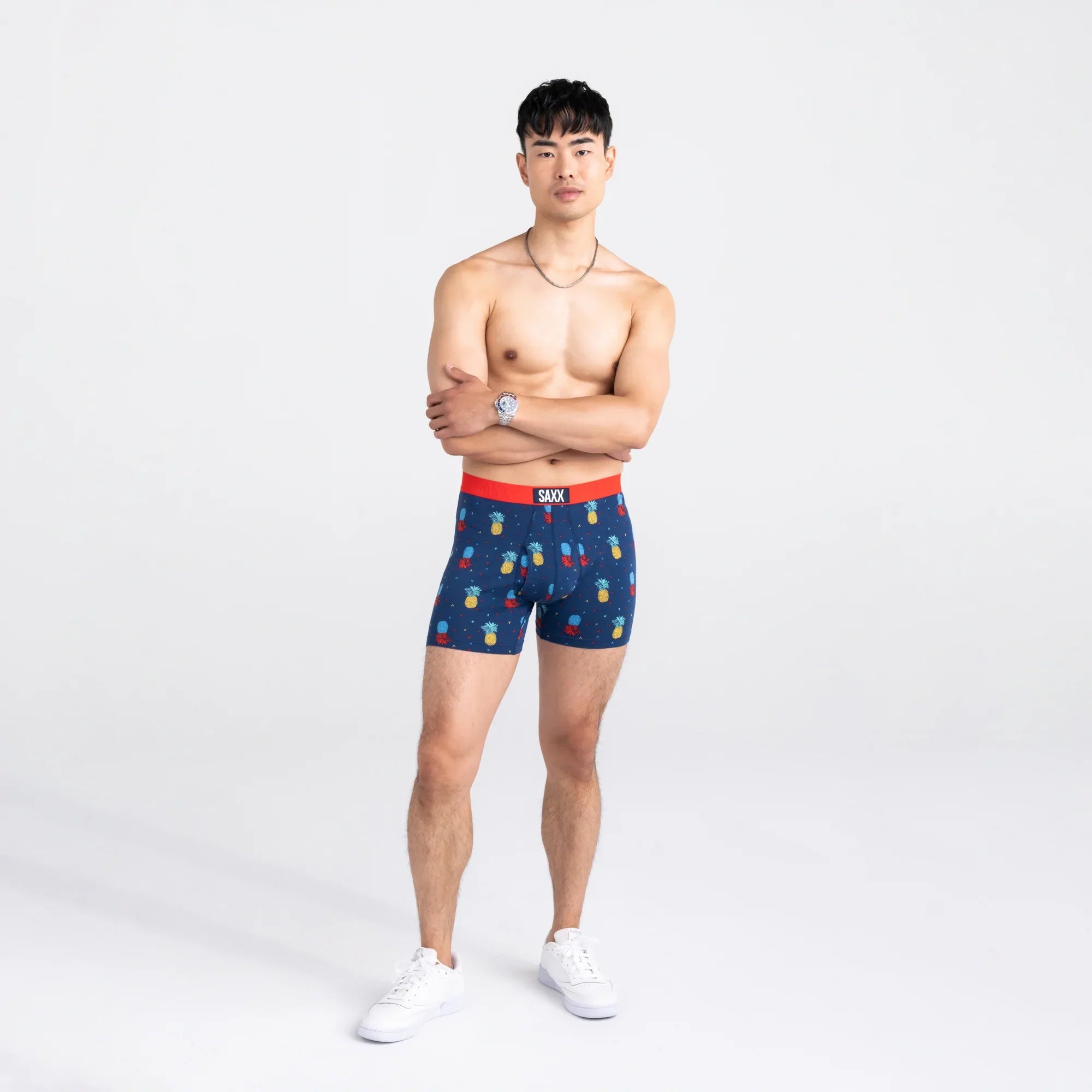 Front - Model wearing Ultra Super Soft Boxer Brief Fly in Pineapple Flip- Navy