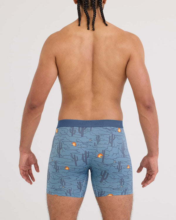 Back - Model wearing Quest Quick-Dry Mesh Boxer Brief in Canyonlands-Washed Blue