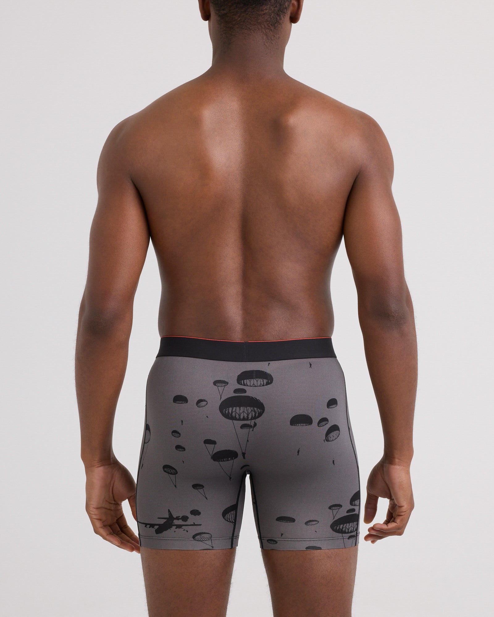 Back - Model wearing Multi-Sport Mesh Boxer Brief 3 Pack in Army Black/Op Camo/Sky