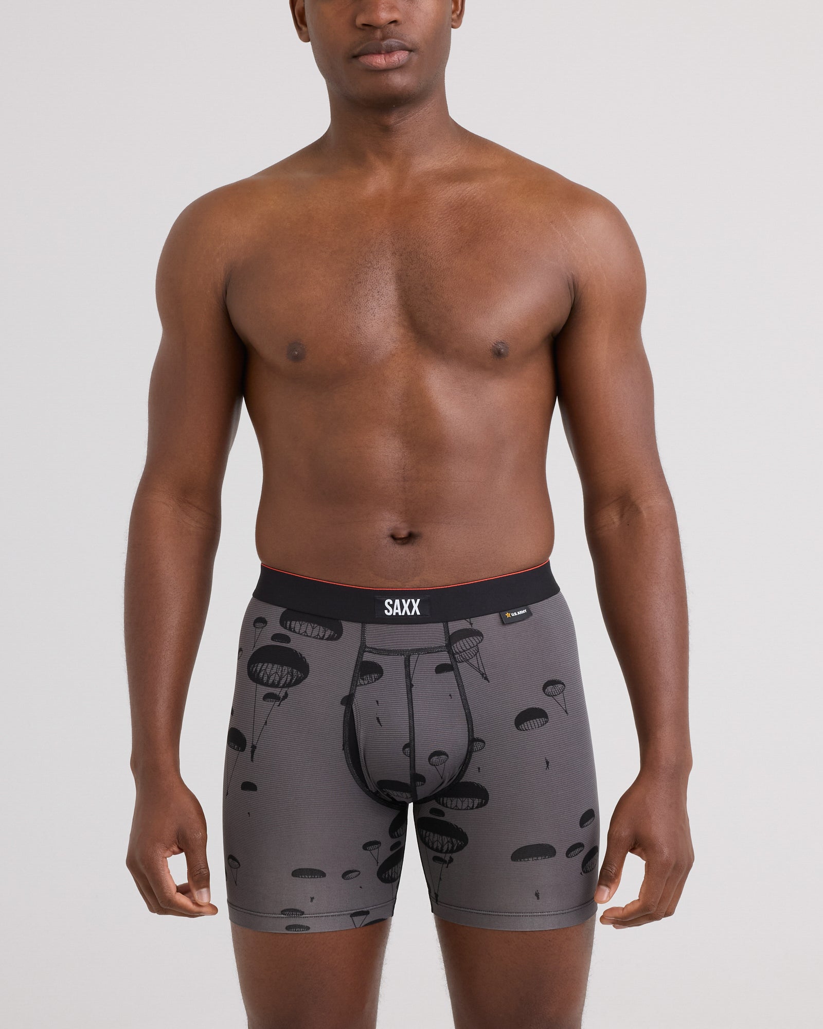 Front - Model wearing Multi-Sport Mesh Boxer Brief 3 Pack in Army Black/Op Camo/Sky