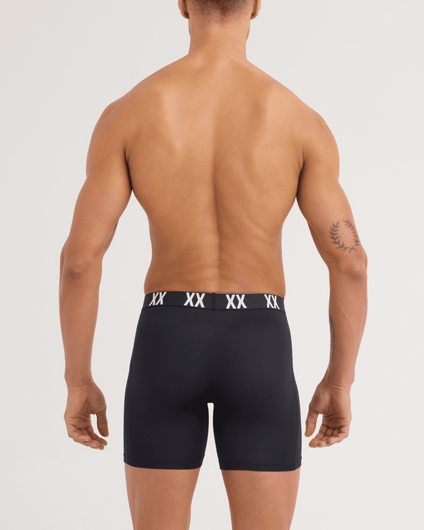 Back - Model wearing Multi-Sport Mesh Boxer Brief in Black/XX Waistband