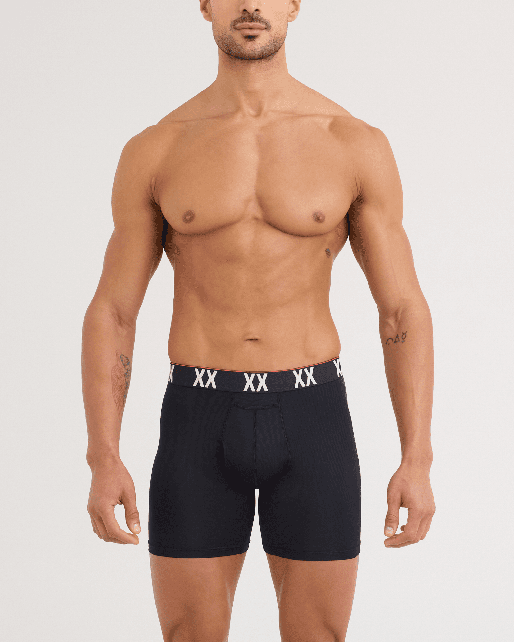 Front - Model wearing Multi-Sport Mesh Boxer Brief in Black/XX Waistband