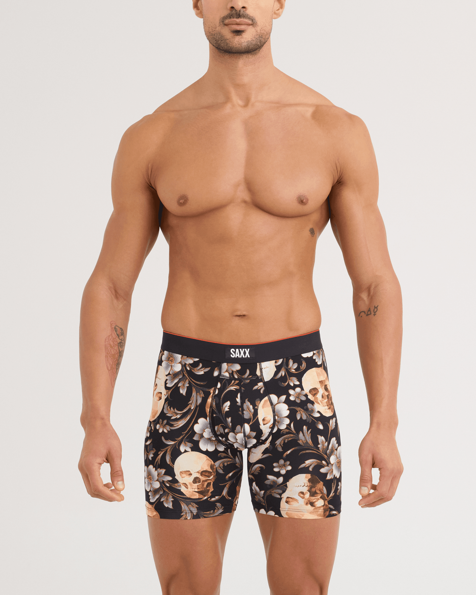 Front - Model wearing Multi-Sport Mesh Boxer Brief in Gold Skull-Black