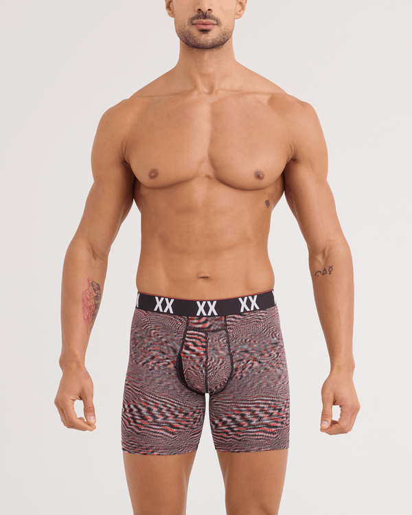 Front - Model wearing Multi-Sport Mesh Boxer Brief in Hyperspace-Red Hot