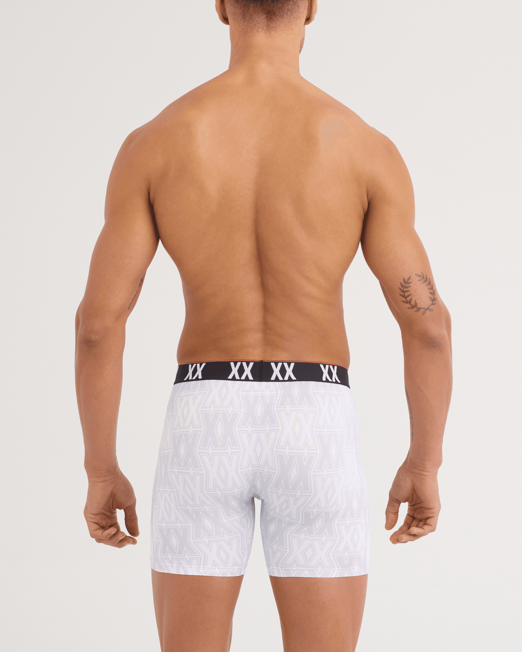 Back - Model wearing Multi-Sport Mesh Boxer Brief 3 Pack in XXcellence/Tradewinds/Black