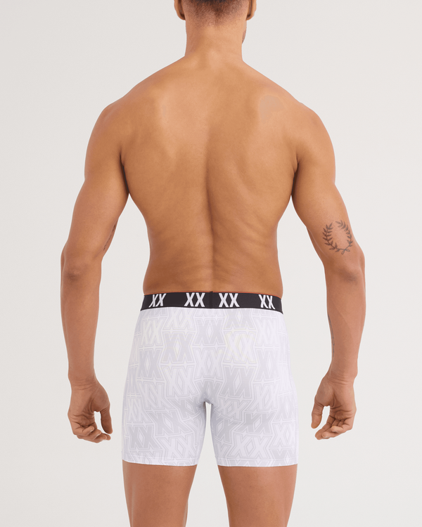 Back - Model wearing Multi-Sport Mesh Boxer Brief 3 Pack in XXcellence/Tradewinds/Black
