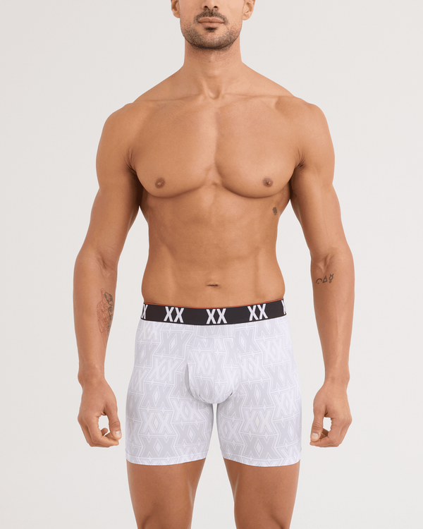 Front - Model wearing Multi-Sport Mesh Boxer Brief 3 Pack in XXcellence/Tradewinds/Black