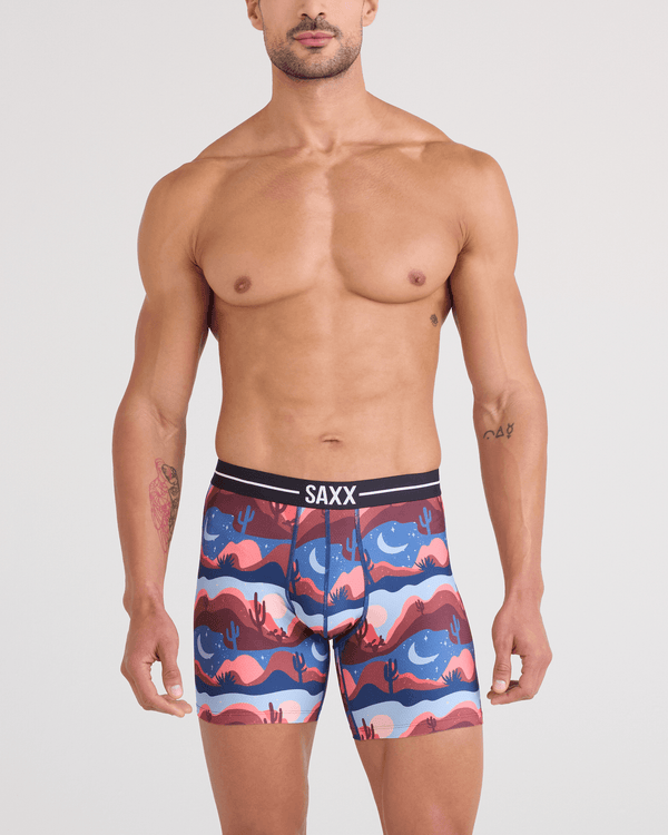 Front - Model wearing  Volt Breathable Mesh Boxer Brief in Canyon Daze-Red Clay