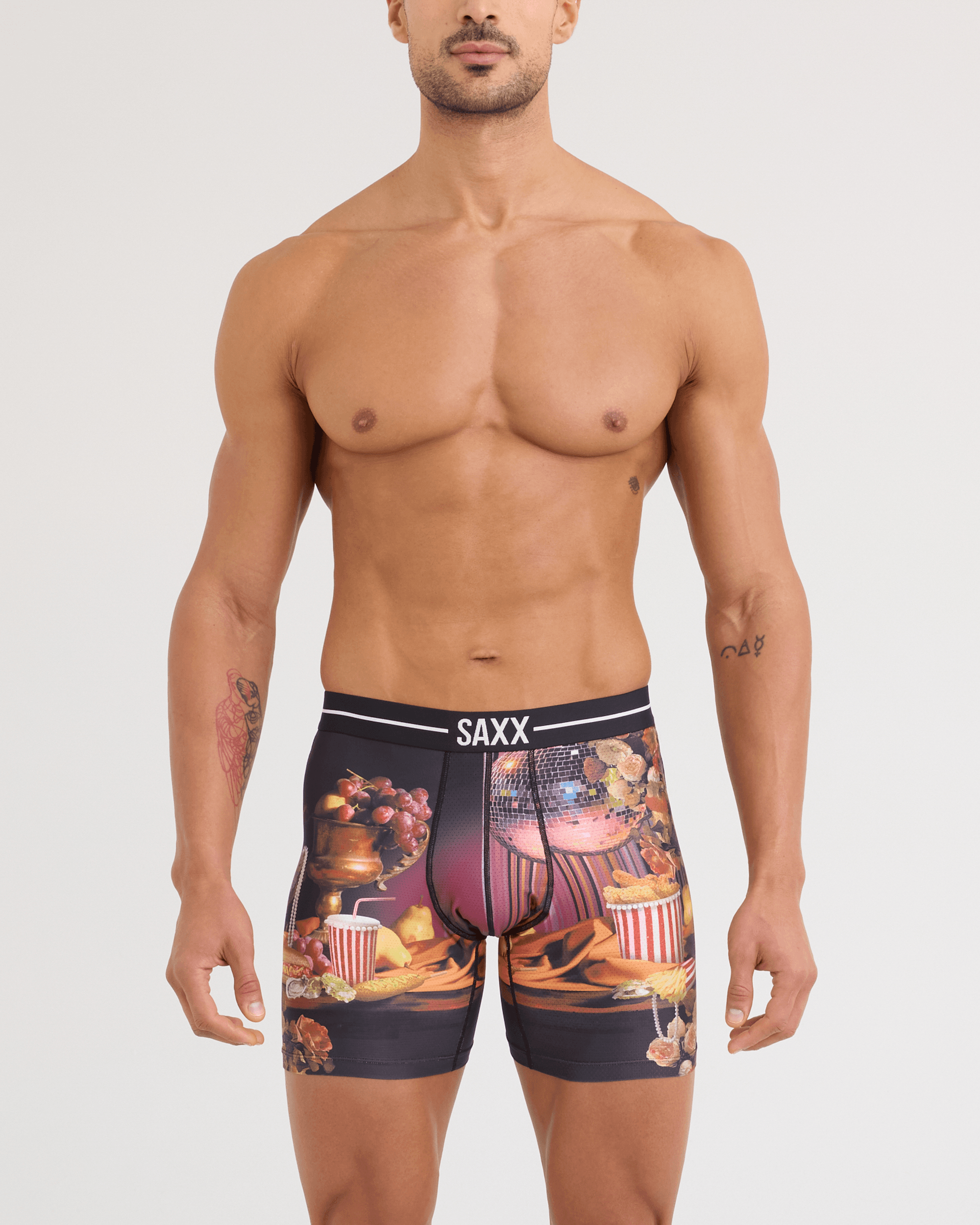 Front - Model wearing Volt Breathable Mesh Boxer Brief in Disco Fries-Maroon