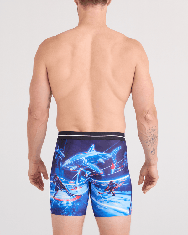 Back - Model wearing  Volt Breathable Mesh Boxer Brief in Sharks Vs Bros-Blue