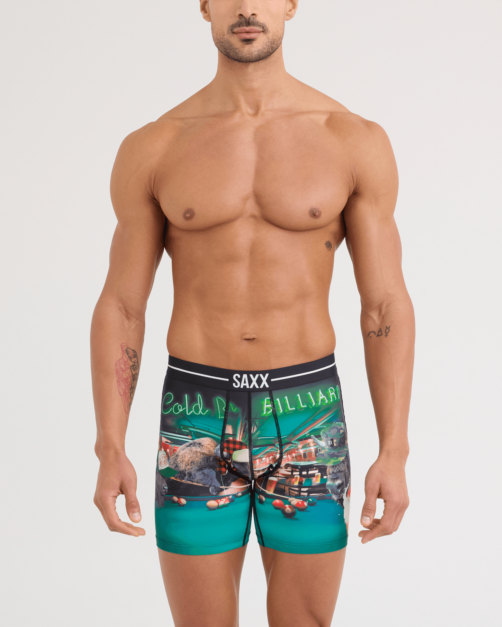 Front - Model wearing Volt Breathable Mesh Boxer Brief in TGI Guyday-Green