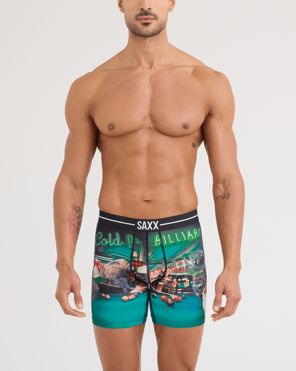 Front - Model wearing Volt Breathable Mesh Boxer Brief in TGI Guyday-Green
