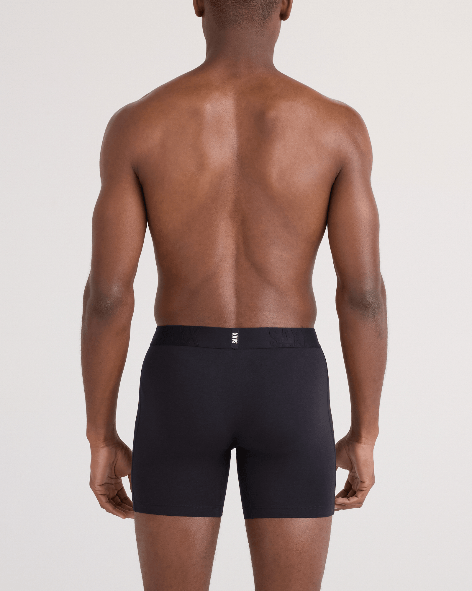 Back - Model wearing  DropTemp Cooling Cotton Boxer Brief Fly 5 Pack in Black