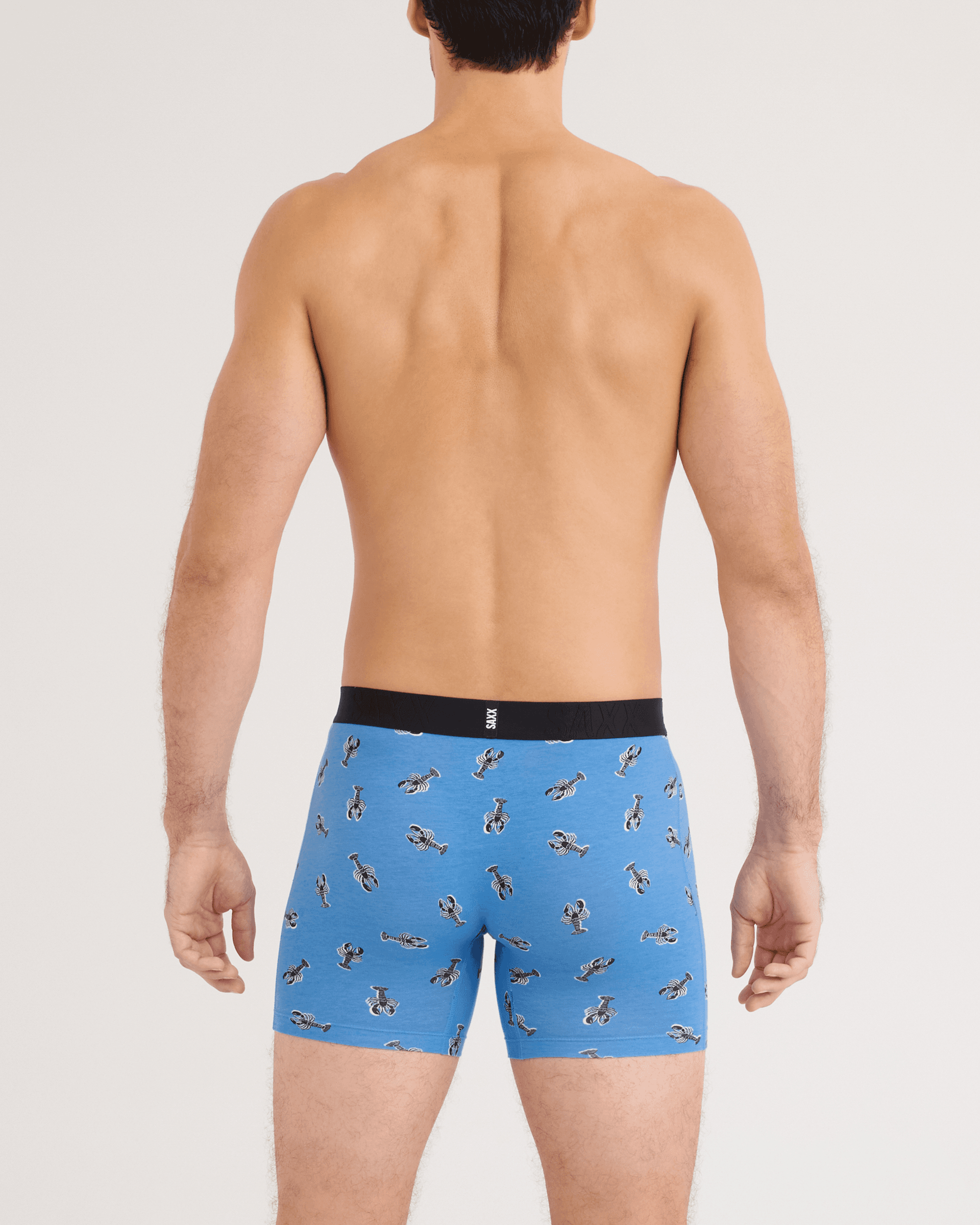 Back - Model wearing DropTemp Cooling Cotton Boxer Brief 2 Pack in Lobster Boil/Black