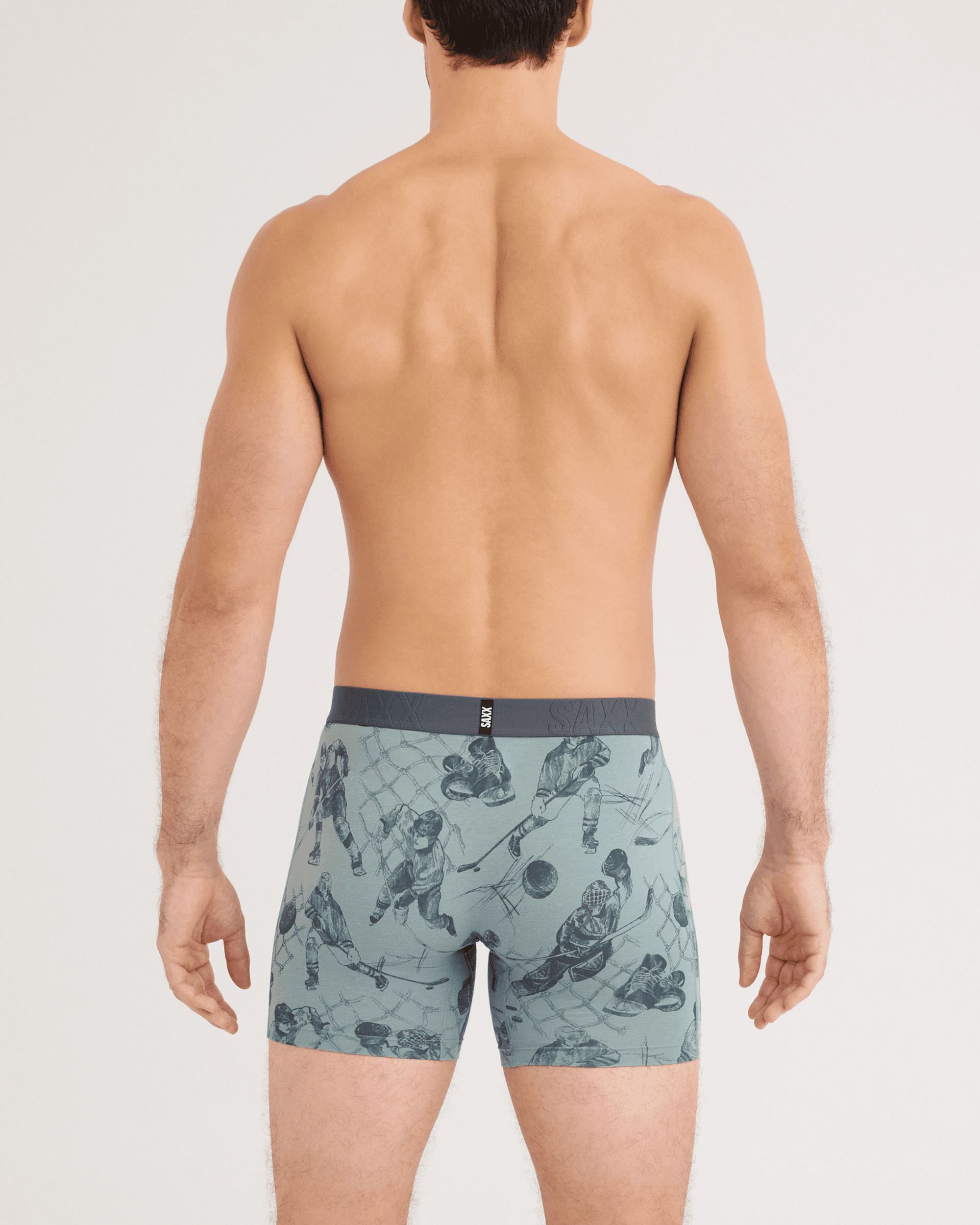 Back - Model wearing DropTemp Cooling Cotton Boxer Brief in Off The Boards-Silver Pine