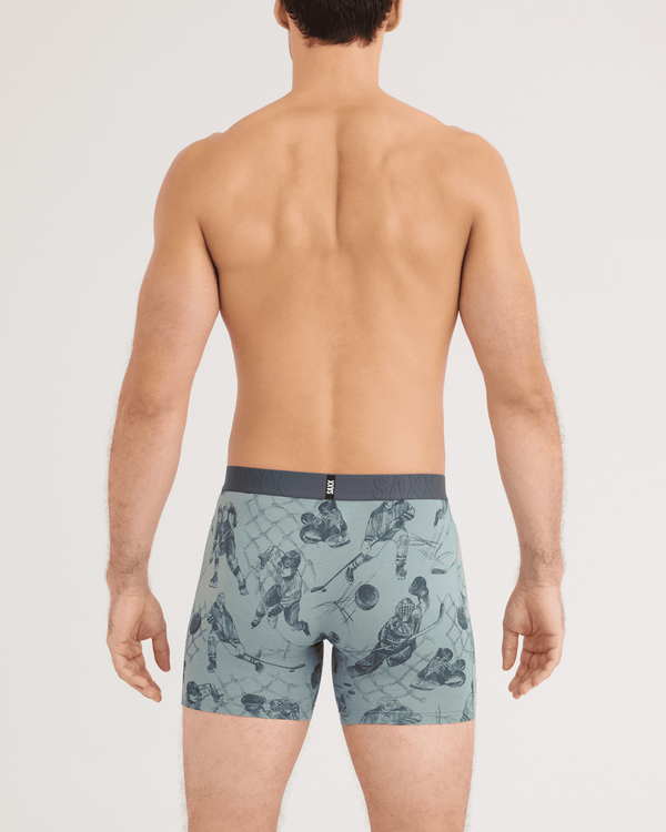 Back - Model wearing DropTemp Cooling Cotton Boxer Brief in Off The Boards-Silver Pine