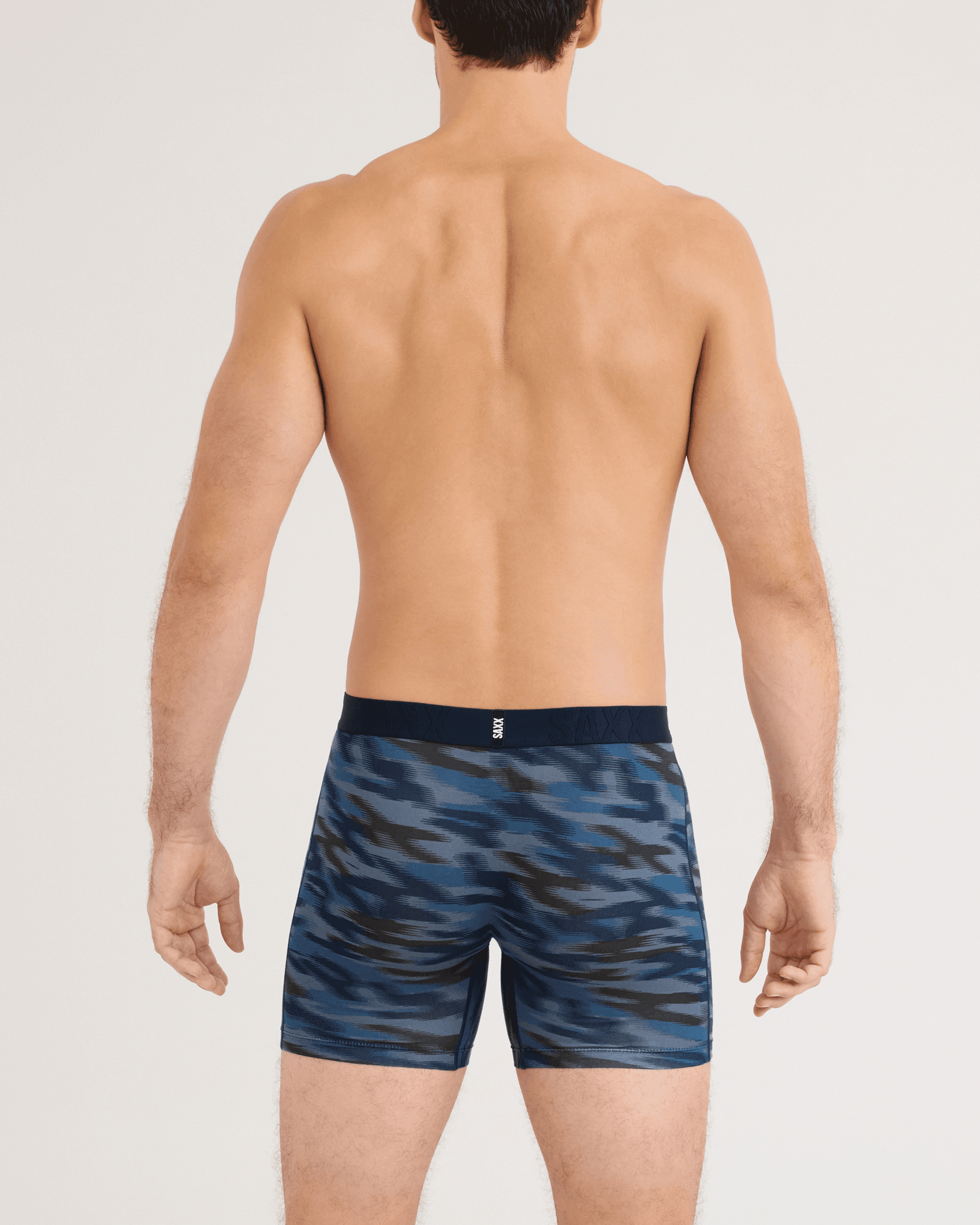 Back - Model wearing DropTemp Cooling Cotton Boxer Brief 3 Pack in Swift Camo/Dark Ink/Black