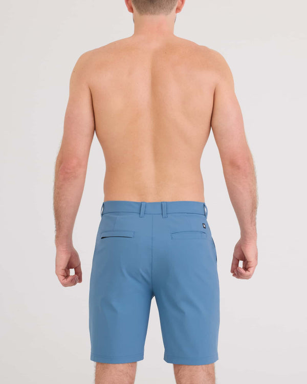 Back - Model wearing Caddie Short 8" in Slate