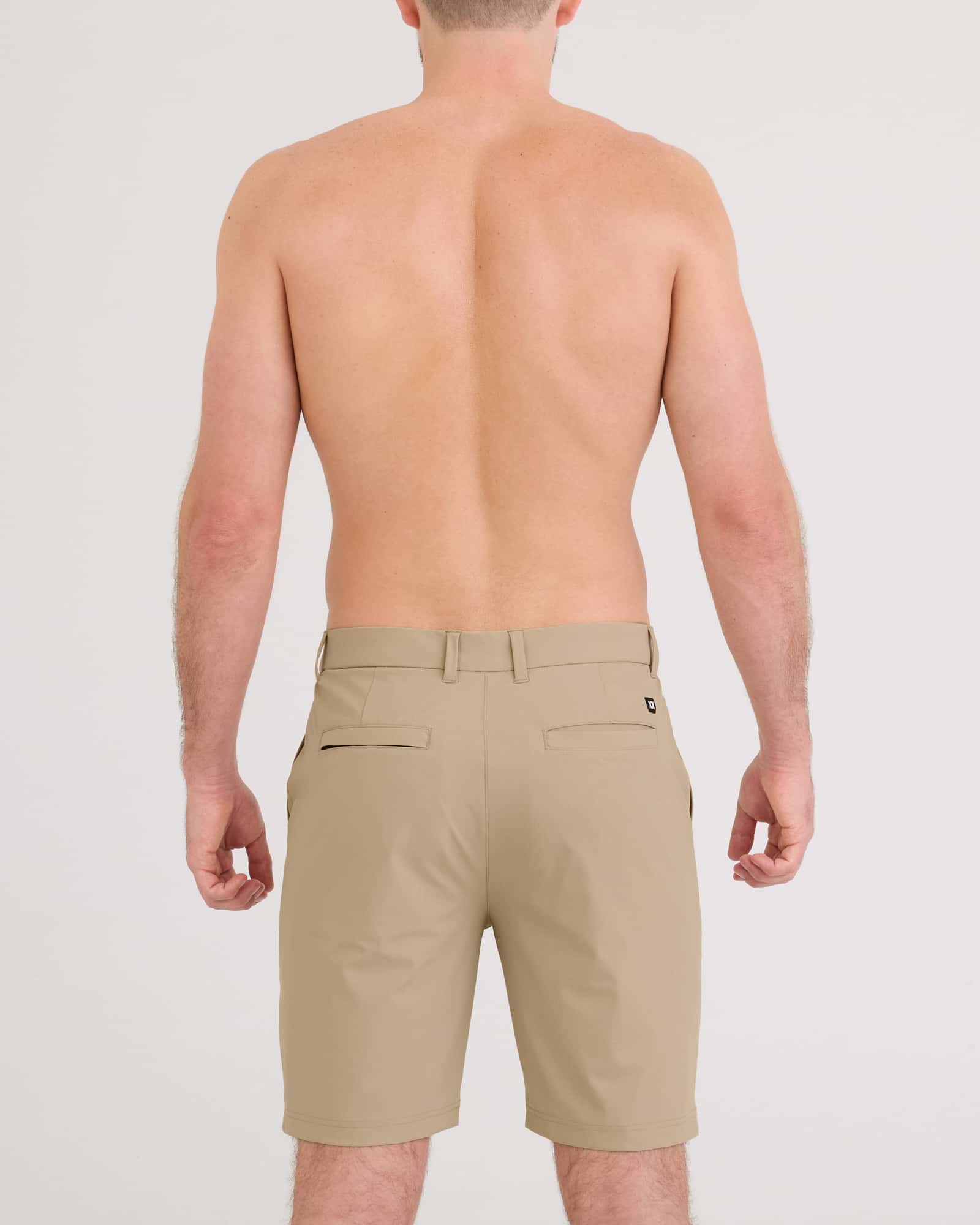 Back - Model wearing Caddie Short 8" in The Perfect Khaki