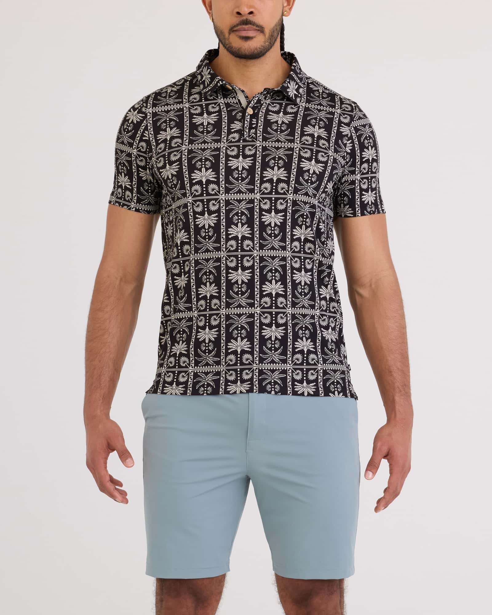 Front - Model wearing Droptemp Dry Polo in Tropic Royale-Black