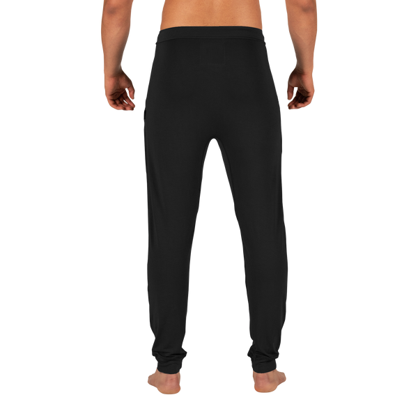 Back - Model wearing Snooze Pant in Black