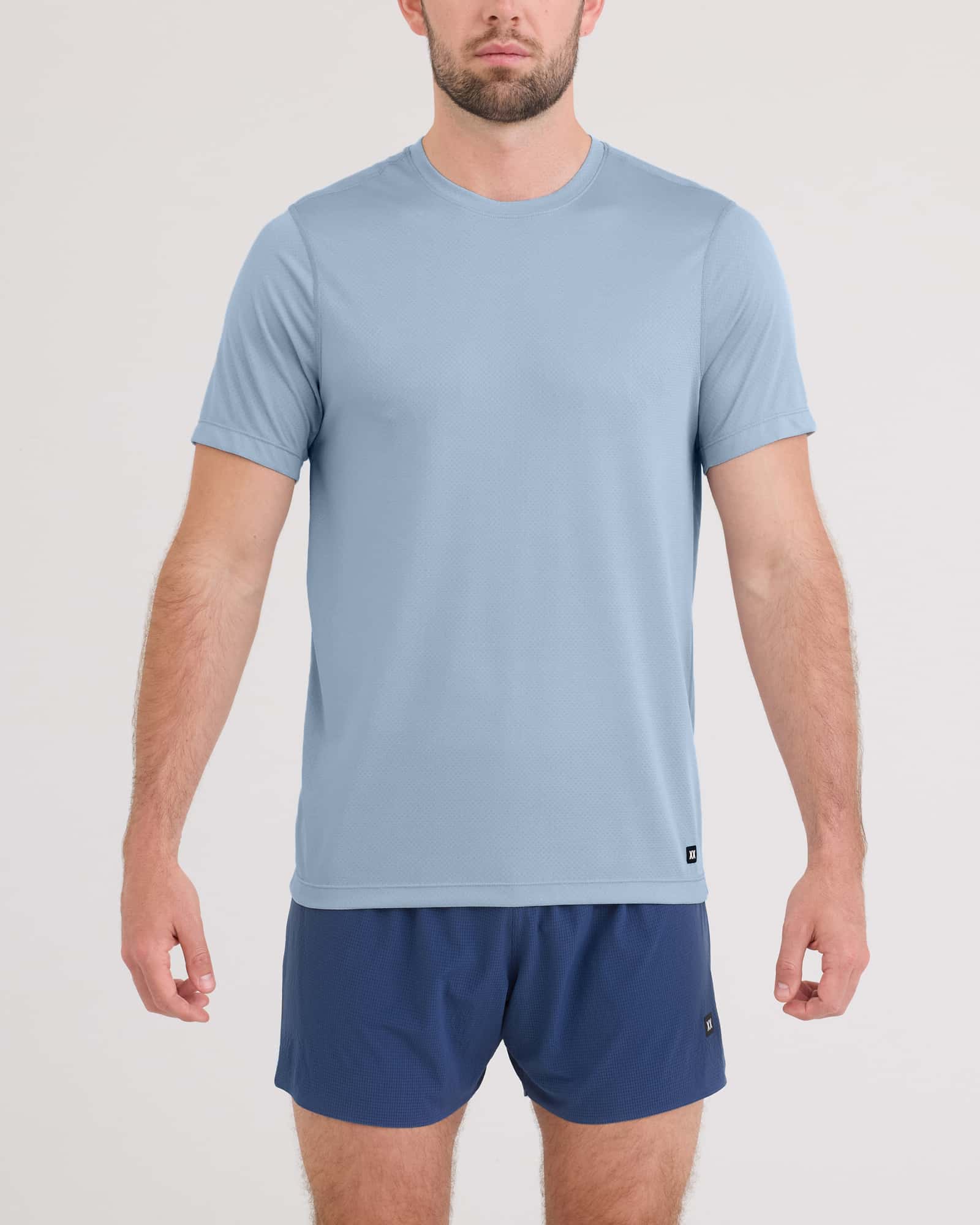 Front - Model wearing Multi-Sport Tech Tee in Blue Fog